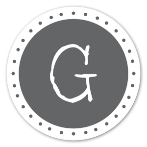 Sticker gris avec la lettre G.