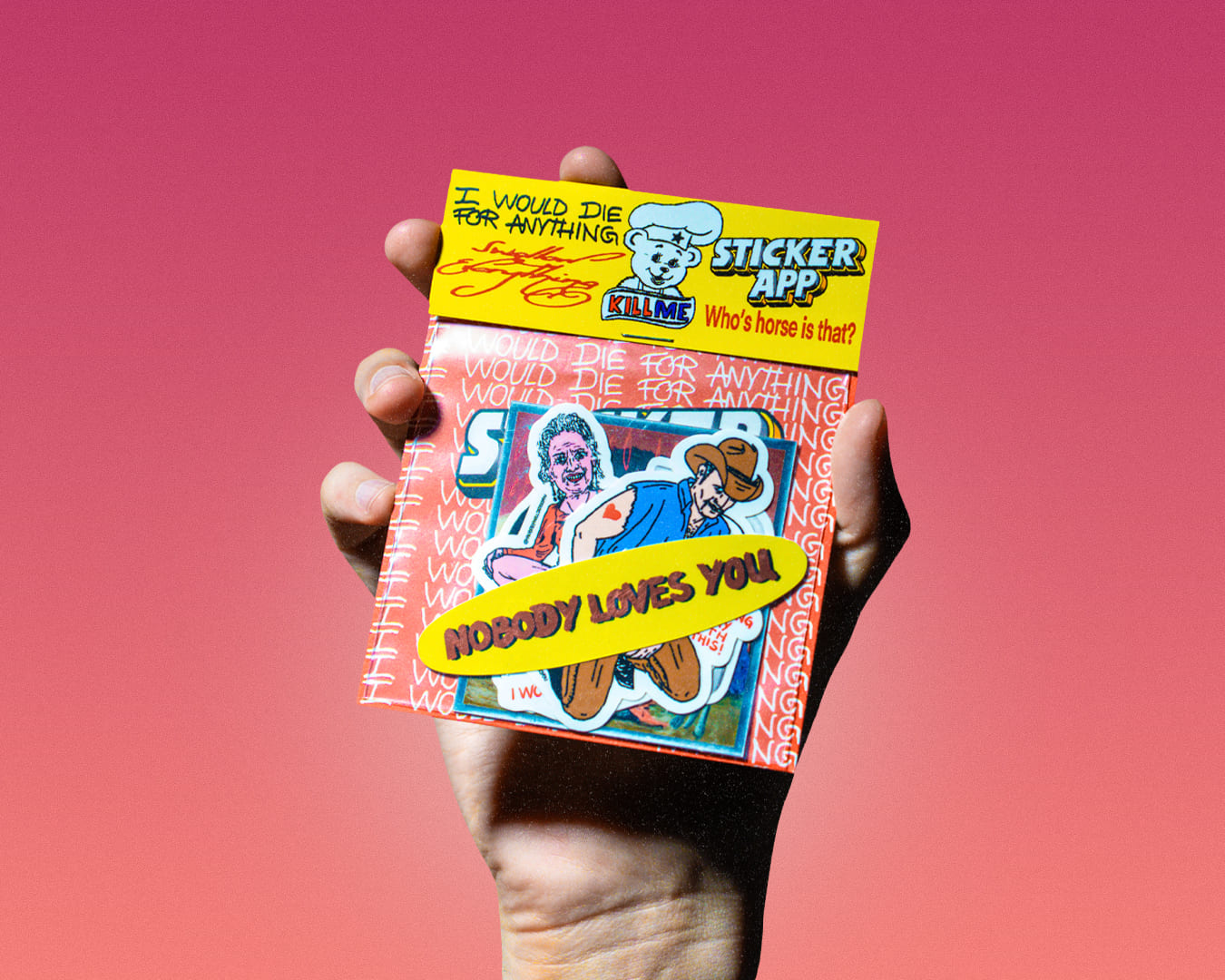A hand holding a stickerpack