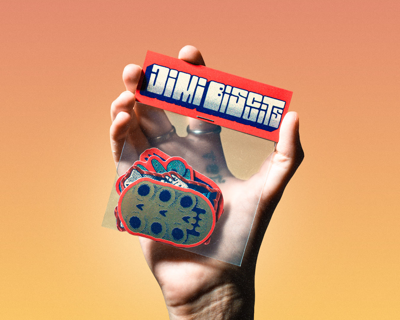 A hand holding a stickerpack